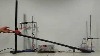 Acceleration of a trolley down a ramp with light gates  GCSE Physics Demo [upl. by Garnes]