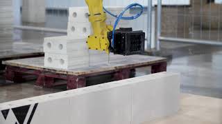 Industrial robot exhibit at work Media Bricklayer robot for automated building construction [upl. by Darra]