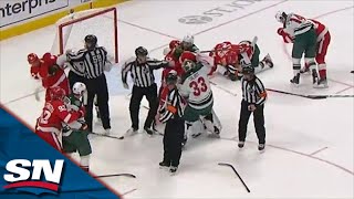 Chaos Ensues As Full Line Brawl Breaks Out Between Red Wings And Wild [upl. by Nylauqcaj424]