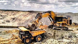 excavator cat 6020b loading truck for open pit mining [upl. by Einolem]