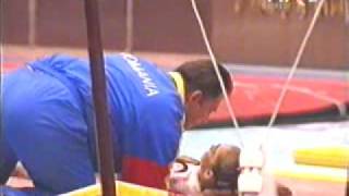 Cosmina Paulescu lands on her head at the 2005 Romanian Nationals after clipping her leg on the bar [upl. by Clerc]