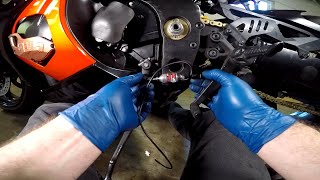 Installing Dynojet quick shifter K7 GSXR1000 [upl. by Eisak]