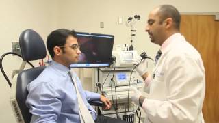 Laryngoscopy and stroboscope to examine the vocal cords [upl. by Anrym]