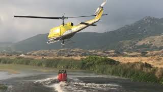 Helicopter collecting water [upl. by Dore]