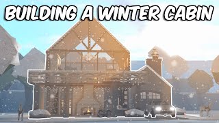 BUILDING A SNOWY WINTER CABIN IN BLOXBURG [upl. by Mccully]