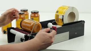 A Jar Being Labelled on the BenchMATE  Manual Labelling Machine [upl. by Nanice]