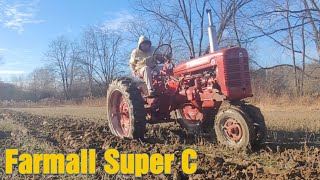 Farmall Super C  Plowing with a 2x14 Moldboard Plow [upl. by Erdnassak]