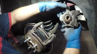 2014 Kia Optima replacing rear brakes [upl. by Delcine586]