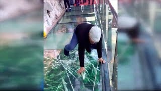 Tourist terrified by new glass walkway that cracks under weight [upl. by Barabbas]