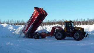 JCB 3200 Plus with hook lift trailer in snow removal [upl. by Inilahs]