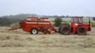 Massey ferguson 1200 baling hay with hesston baler 4700 [upl. by Nnyllaf]