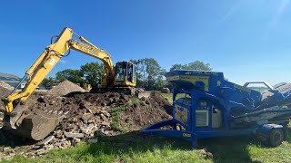 Screening soil with a Komatsu Excavator and Herbst Screener [upl. by Edda]