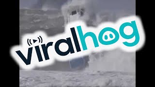 Huge Wave Slams Unmanned Surf Boat  ViralHog [upl. by Thorbert]