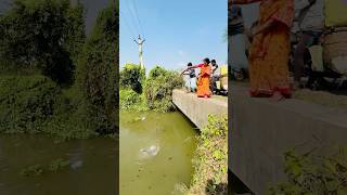 Lady amp a boy hook fishing in the roadside big canal fishingtechniques newfishing fish catfish [upl. by Nylassej675]