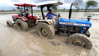 Tochan in Mud New Holland 3630 TX Special Edition VS Mahindra Arjun NOVO 605 Di [upl. by Alyakam947]