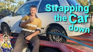 Strapping a Car down on the car trailer just a small tip that might help you out [upl. by Joed286]