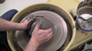 Centering clay on a potters wheel [upl. by Anelegna]