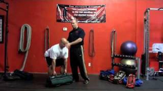 Ultimate Sandbag Training Clean and Press [upl. by Laamaj422]