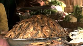 Dried and fermented fish sold at a vegetable market in Senapati Manipur [upl. by Ylerebmik106]