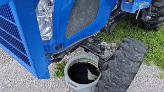 Front Axle Fluid Change on New Holland Workmaster 35  40  And Wow It Needed It [upl. by Acinomed325]