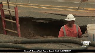 A sinkhole on east Douglas causes problems for drivers business owners and residents [upl. by Zetneuq]