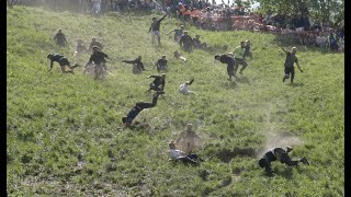 Thrills and spills as Cheese Rolling 2023 leads to MULTIPLE injuries in Gloucestershire UK [upl. by Aitnwahs]