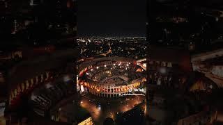 The Roman Colosseum at night from a drone [upl. by Mcclees]