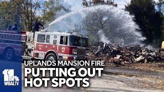 Crews put out hot spots after mansion fire [upl. by Yticilef]