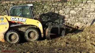 Feeding with Skidsteer  Loading Silage and Scraping Slurry [upl. by Jarrett509]