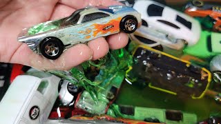 Toy cars slide into slime [upl. by Eveam]