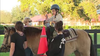 Horseback riding proving to help children with cerebral palsy [upl. by Athalee]