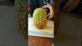 HOW TO SPLIT A PINEAPPLE IN HALF BY HANDPINEAPPLE HACK PINEAPPLE CUTTING SKILL [upl. by Aytida566]