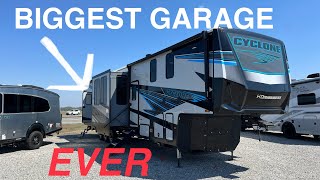 BIGGEST GARAGE THIS IS A TOY HAULER 2024 Heartland Cyclone 4118 [upl. by Ezaria]