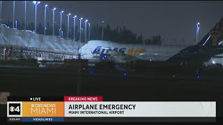 Cargo plane safely lands in Miami International Airport after engine malfunction [upl. by Yttocs]