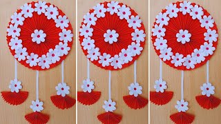 Beautiful paper flower wall decoration idea Unique paper wall hanging kagoj diye ful banano [upl. by Nnayrrehs275]