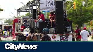 Thousands flock to the 56th annual Toronto Caribbean Carnival Grand Parade [upl. by Esirrehc67]