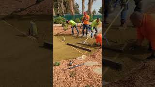 GraniteCrete Permeable Paving  Using Rake to Spread Material During Compaction of an Installation [upl. by Nyrek296]