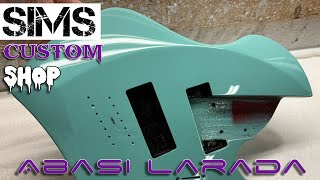 Abasi Concepts Larada 7 string guitar  Taos Turquoise paint by Sims Custom Shop [upl. by Ylliw]