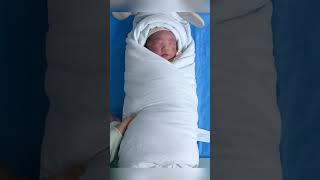 The nurse wrapped the newborn baby up its very cute [upl. by Gula]