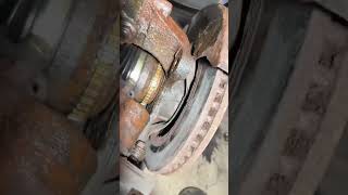 Grinding brake pads with stuck caliper pins and damaged rotor 108kmiles original hardware [upl. by Eceerahs]