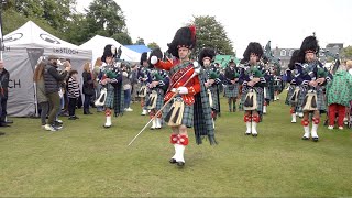 Drum Major Esson leads Ballater Pipe Band playing on the march into 2023 Aboyne Highland Games [upl. by Stefa]