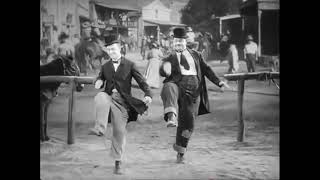 Laurel amp Hardy dance to Technotronic [upl. by Cirderf]