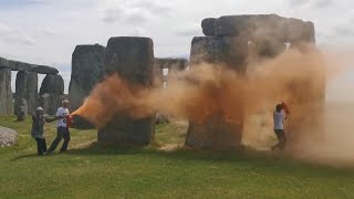 Activists Vandalize Stonehenge With Orange Paint [upl. by Otrevogir]