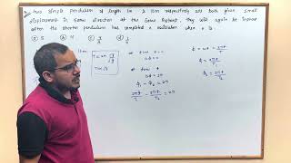 Two simple pendulums of length 1 m and 16 m respectively are both given small displacements in the [upl. by Neffets]