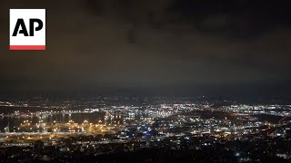 Security personnel clear rubble after sirens and blasts heard in Haifa [upl. by Itsrejk]