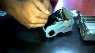 How to change ribbon on Fargo DTC1250e ID DirectToCard Printer amp Encoder [upl. by Lorrac406]