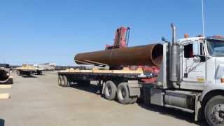 Steel pipe loading for our clients construction needs in Prudhoe Bay June 2013 [upl. by Yanrahs557]