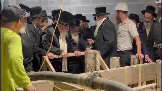 Skver Rebbe Pouring Cement For His Private Mikva To be built in the new Beis medrash [upl. by Patterman]