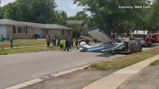 Small plane crash lands on street of Wisconsin neighborhood [upl. by Onitnas459]