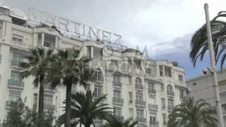 Milla Jovovich Photoshoot on the roof of the Martinez Hotel in Cannes France [upl. by Gnim158]